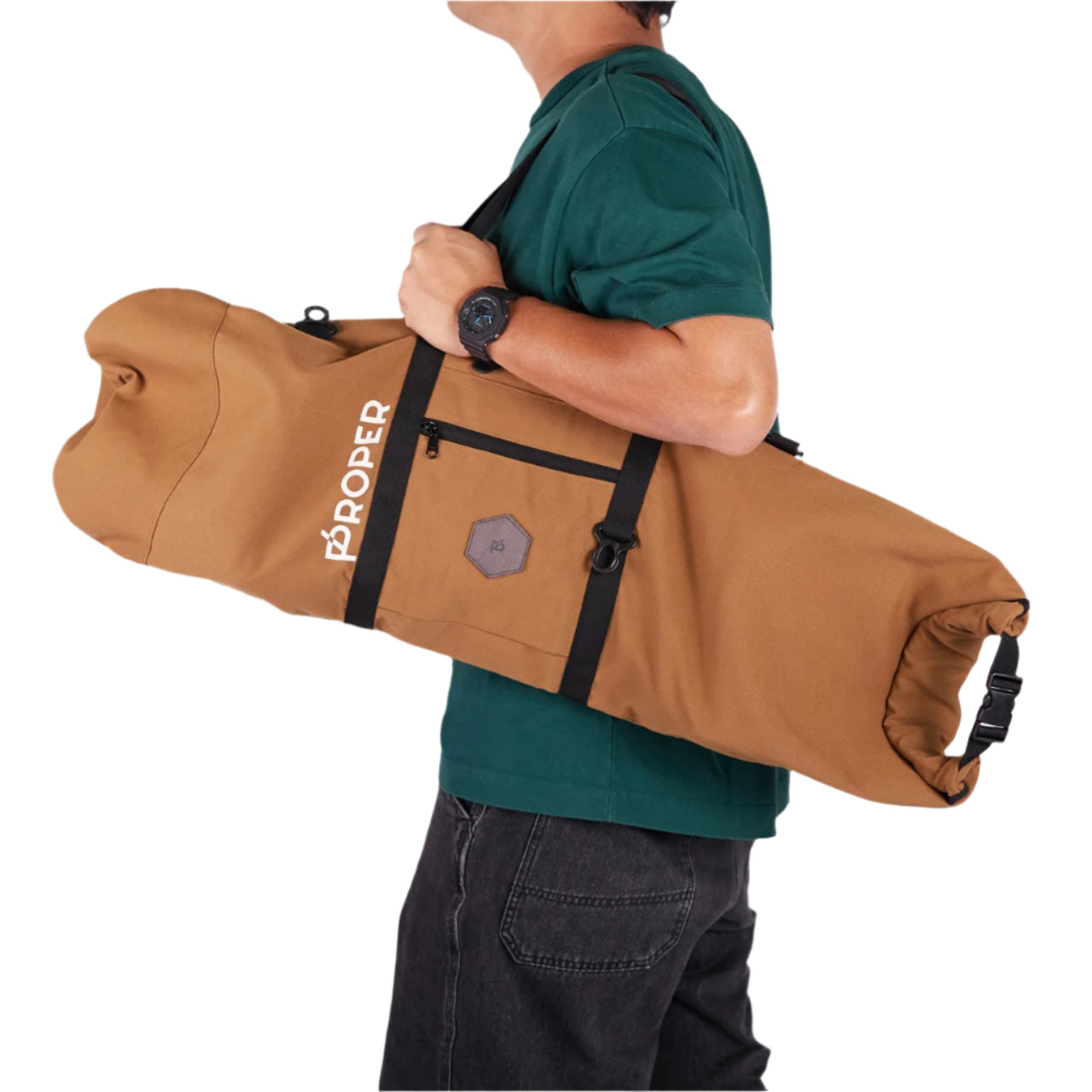 A brown color Proper Authentic Skate Bag with a shoulder strap, a small front pocket, and a zippered back pocket, made from water-resistant canvas fabric.